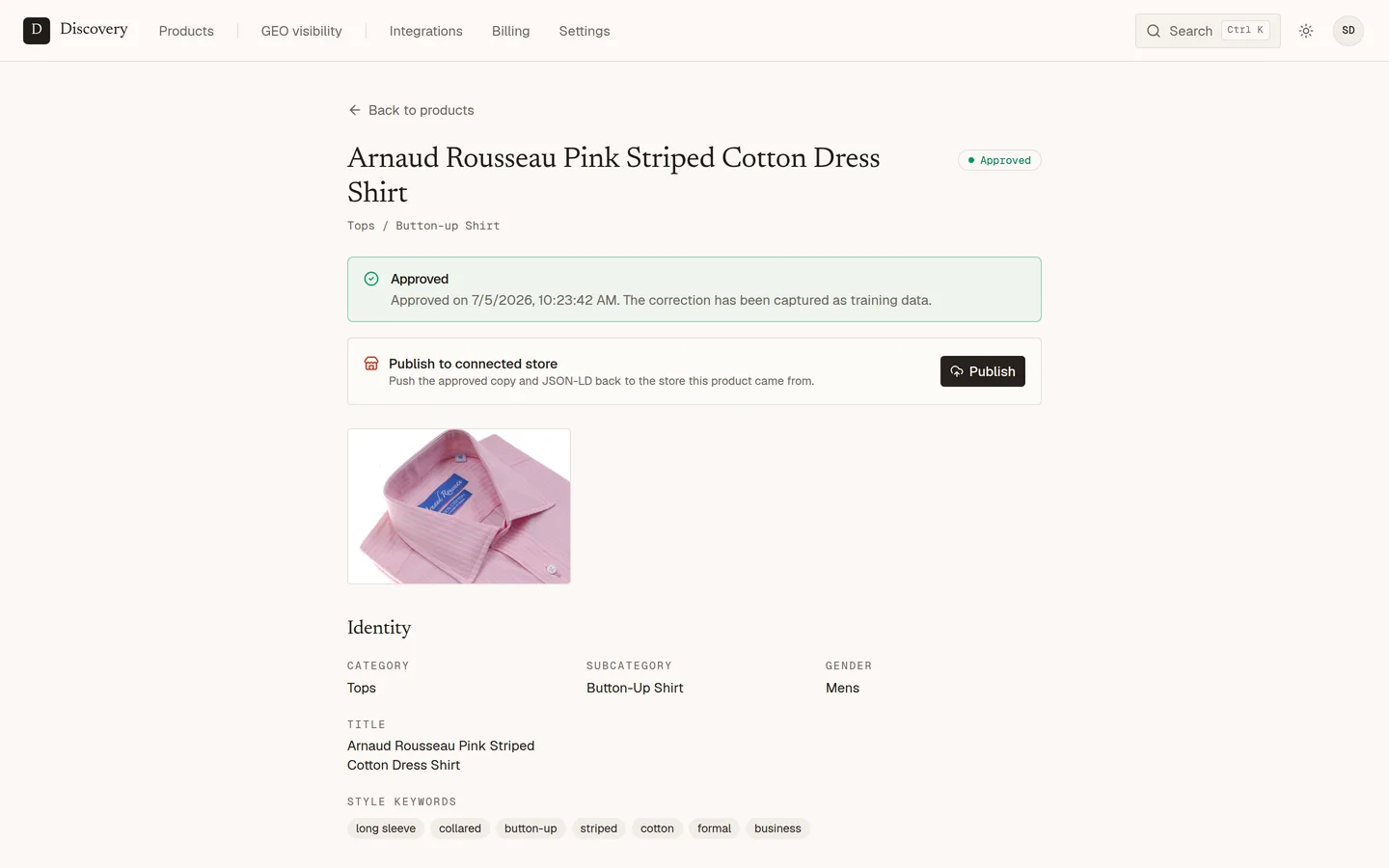 A product's extracted attributes, each with a confidence percentage, two fields flagged for review.